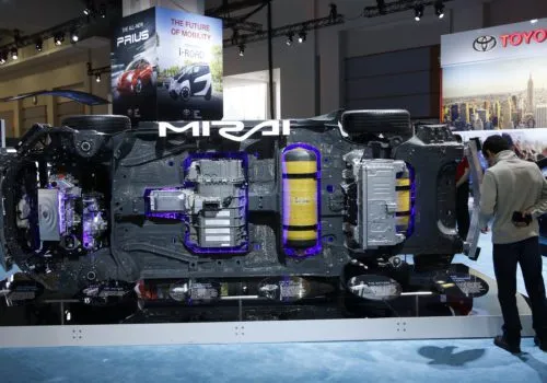 A visitor looks at the underside components of a Toyota Mirai hydrogen fuel cell vehicle at the Washington Auto Show in Washington January 29, 2016. REUTERS/Gary Cameron - RTX24Z1R