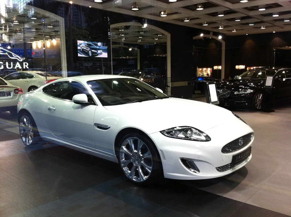 HK Wan Chai 56 Gloucester Road BEA Harbour View Centre shop Jaguar showroom interior white car Nov-2012